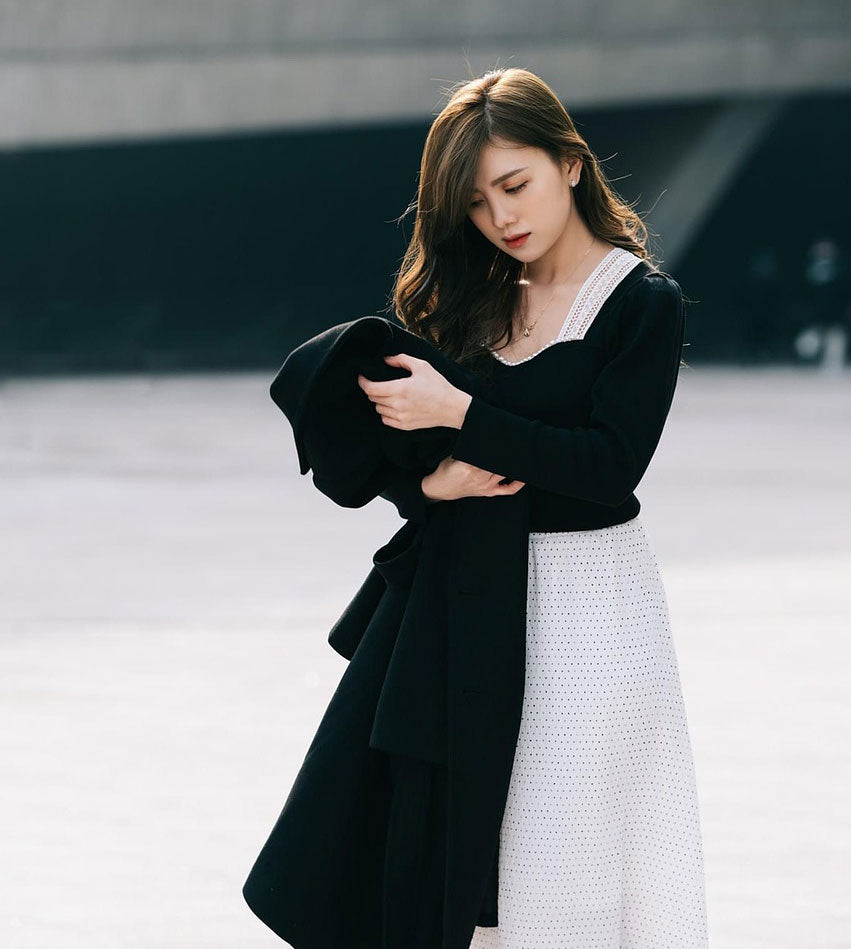 Girl in black coat